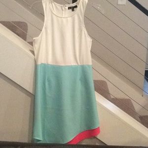 White & soft bluish green dress